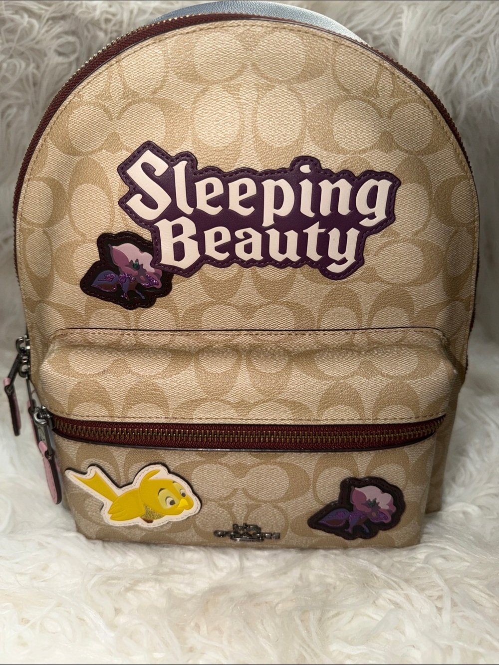 Like New Disney Vintage Coach Mini Backpack with Sleeping Beauty Patches